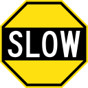 Early_Australian_road_sign_-_Slow_(octagon).svg